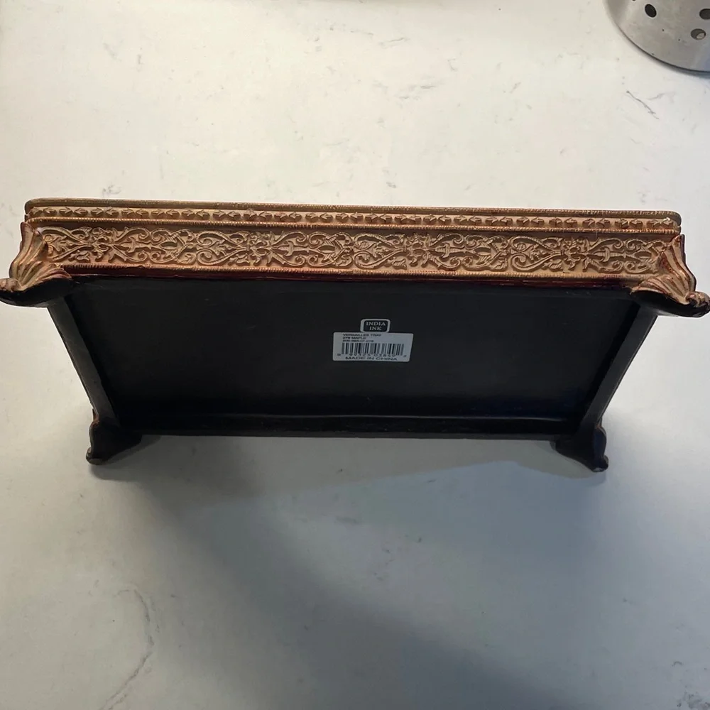 Brown, red and gold rectangular trinket dish